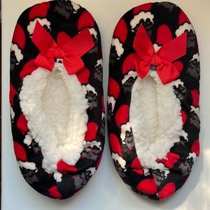 Cat Sleeping in Stocking Slipper Socks